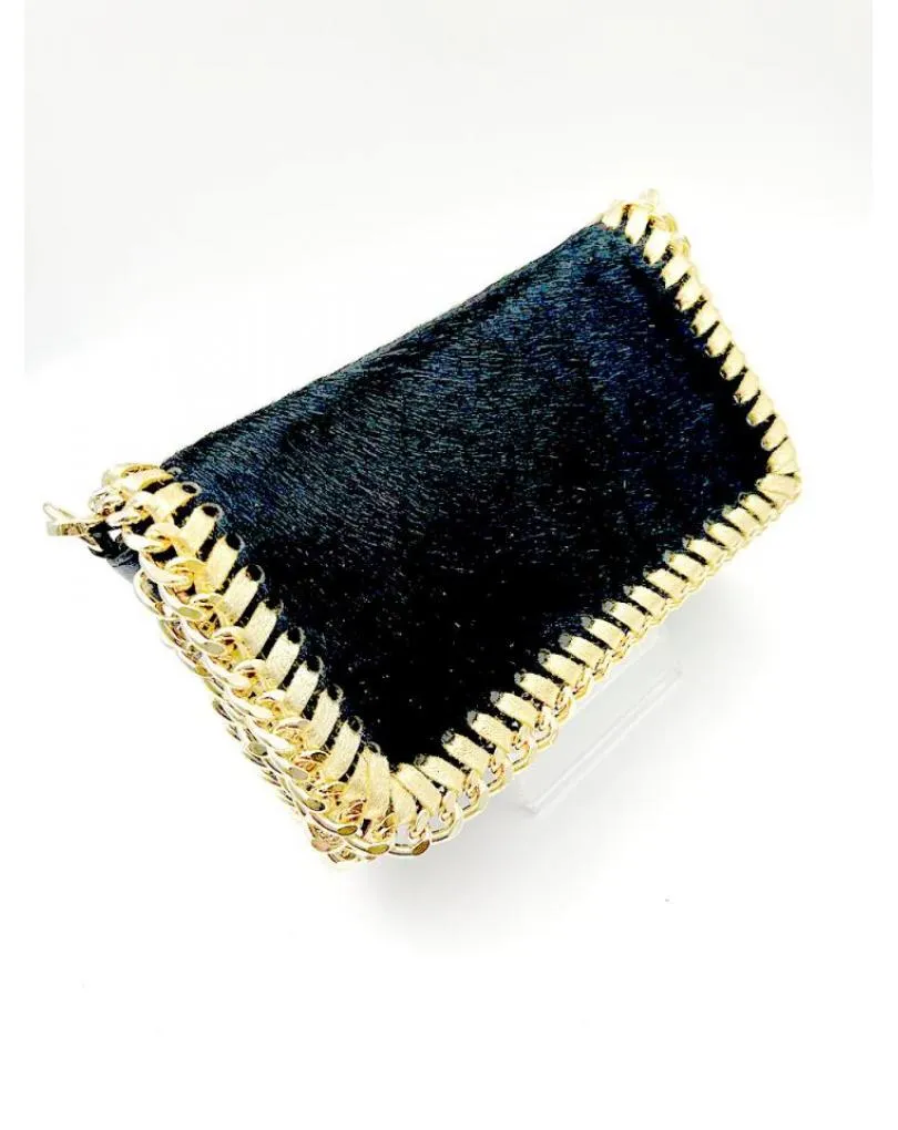 Black leather small design bags for evening and weddings.