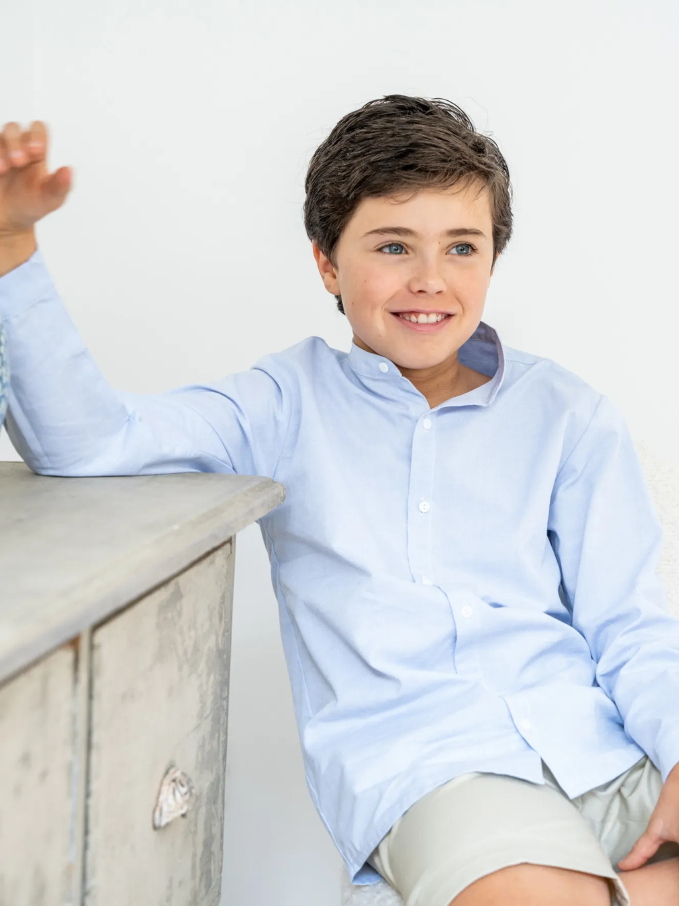 Blue Oxford shirt.