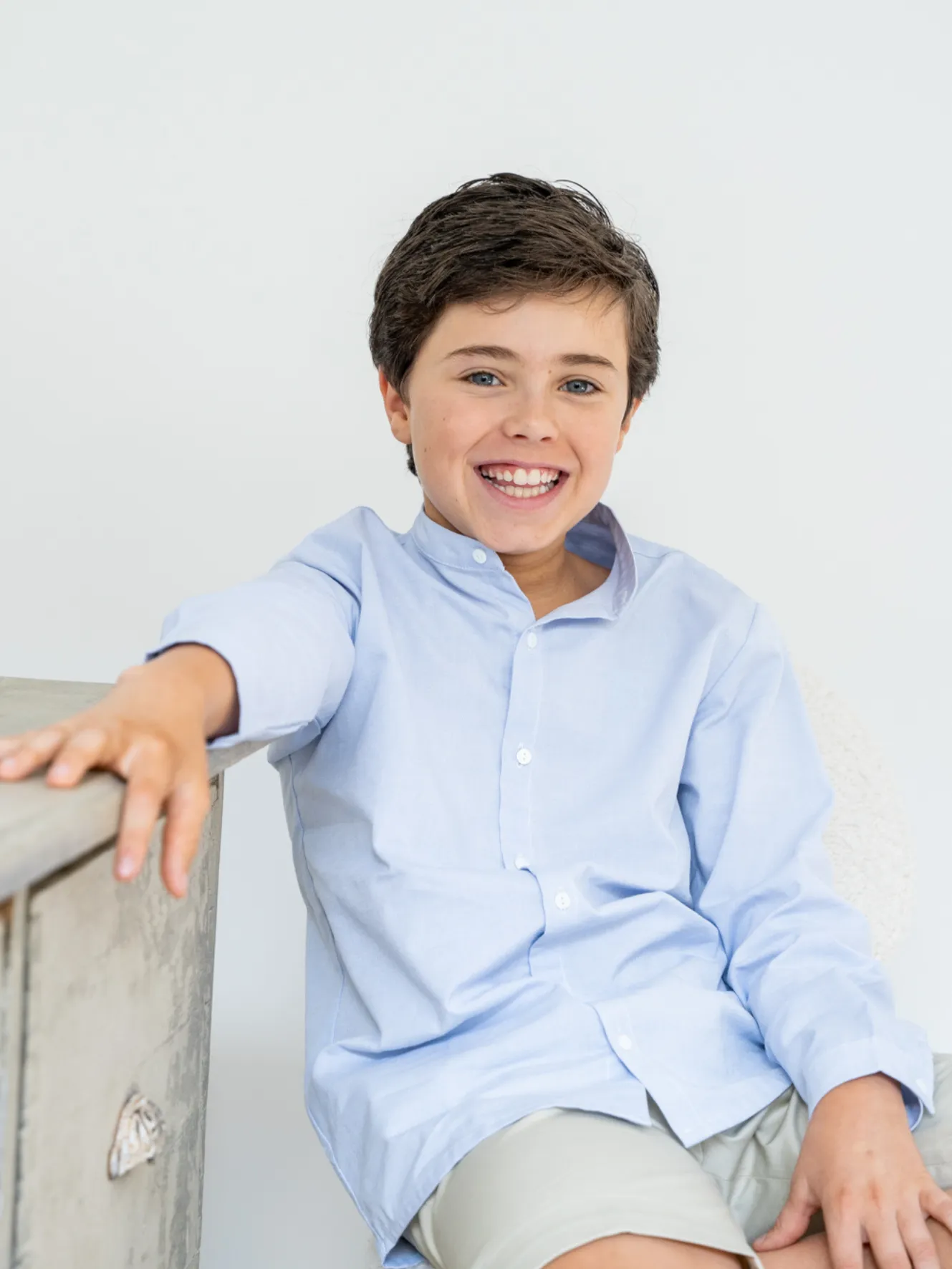 Blue Oxford shirt.