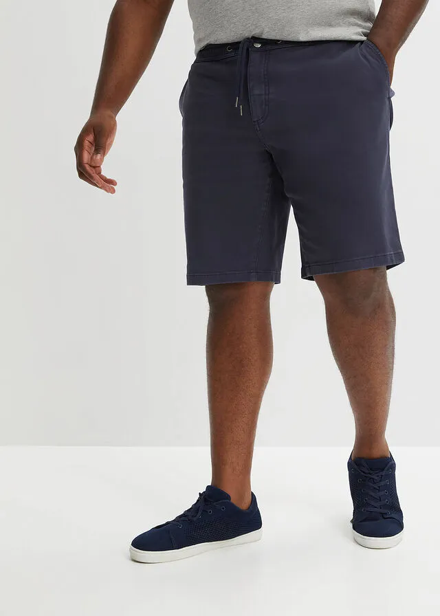 Brown distressed loose fit colored denim Bermuda shorts