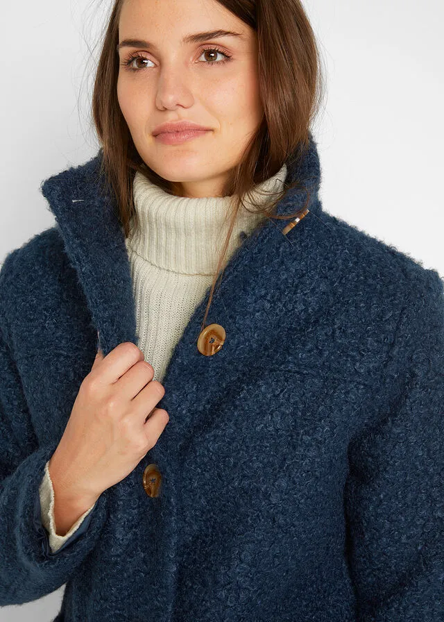 Dark blue bouclé coat with pockets