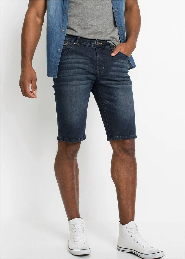 Dark blue slim fit stretch denim Bermuda shorts.