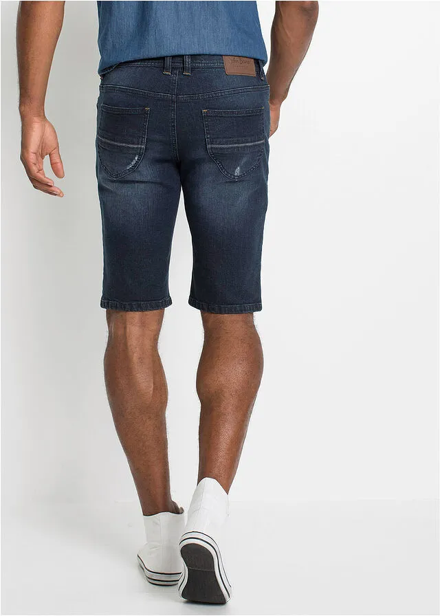 Dark blue slim fit stretch denim Bermuda shorts.