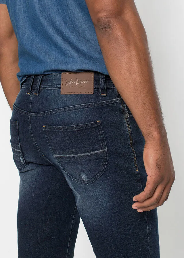 Dark blue slim fit stretch denim Bermuda shorts.