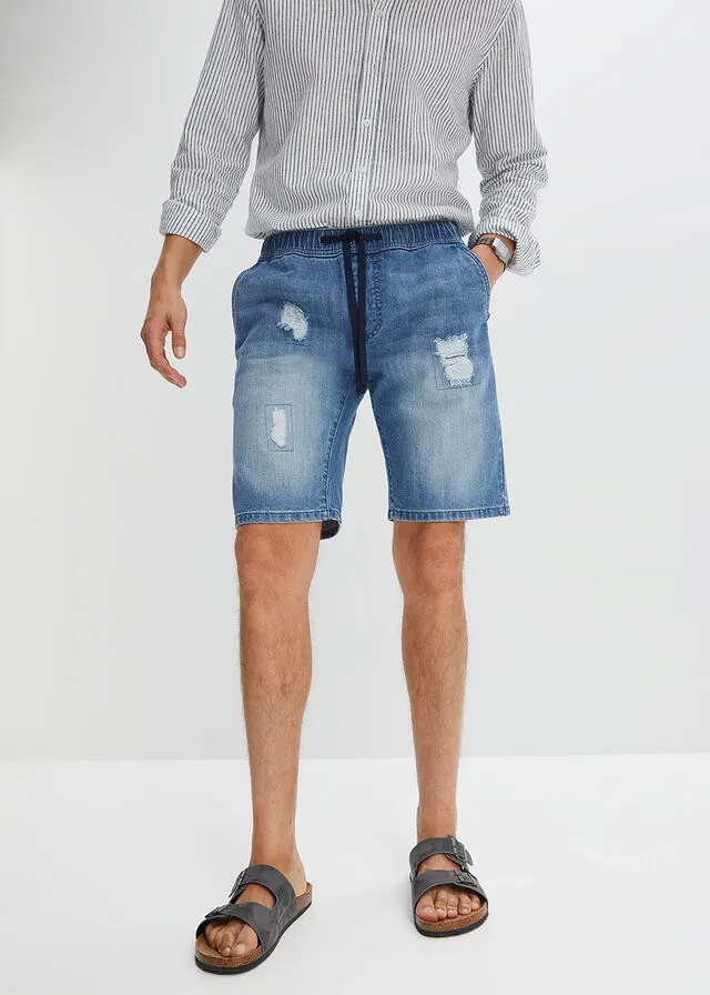 Denim Bermuda shorts with stretch waistband and distressed regular fit.