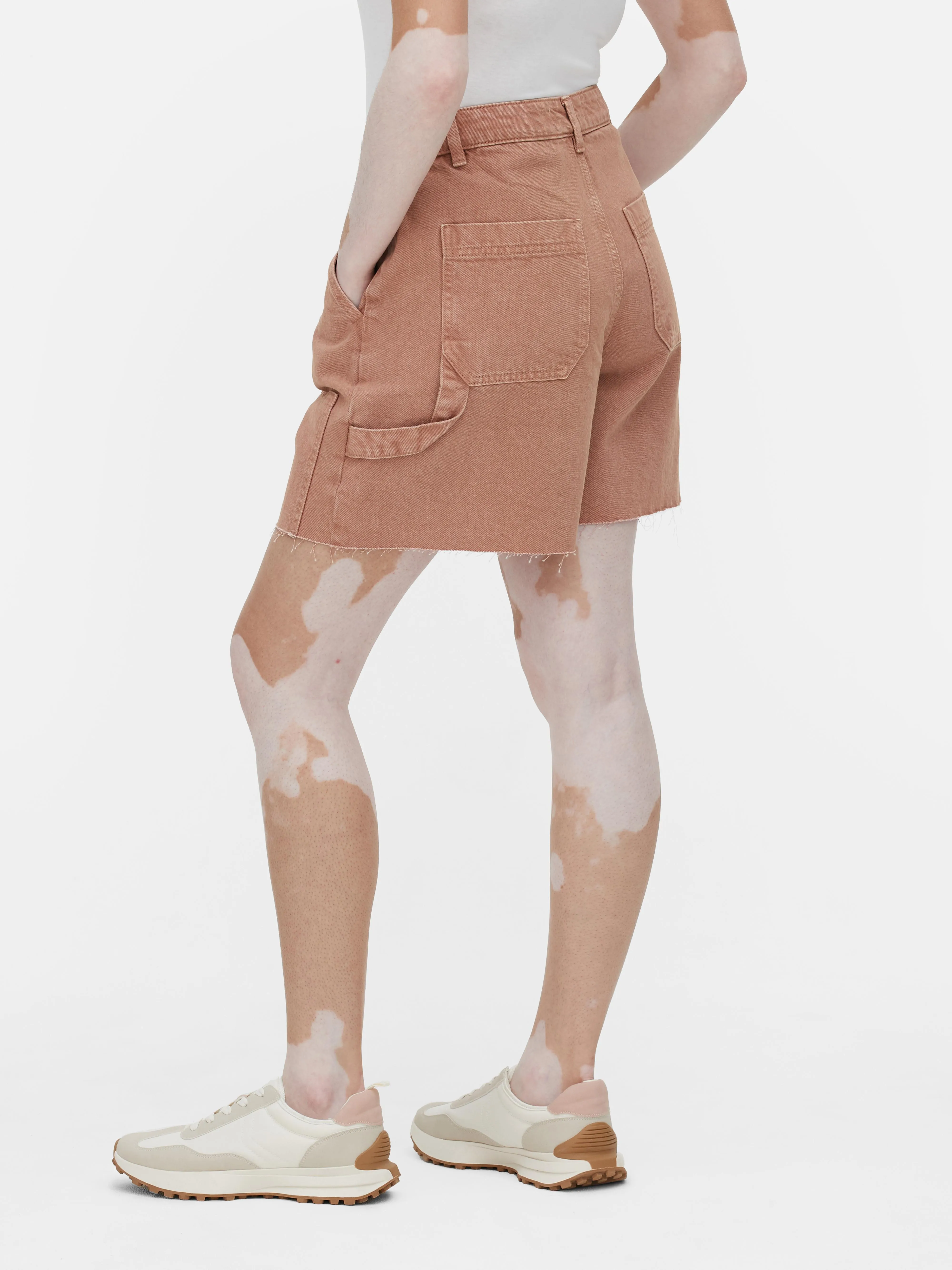 Denim carpenter style Bermuda shorts.