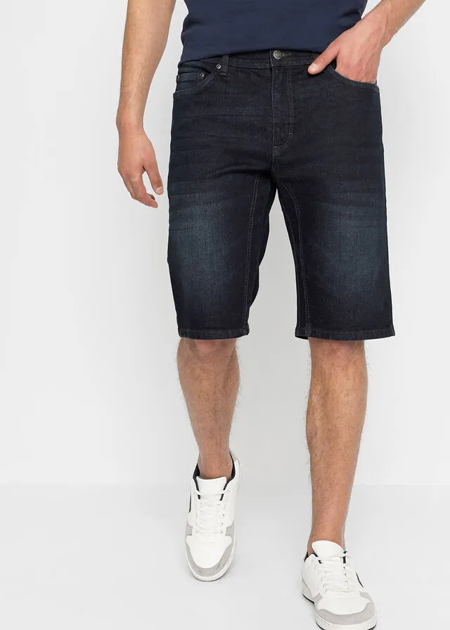 Elastic denim bermuda shorts with reinforced inseam, regular fit in dark wash.
