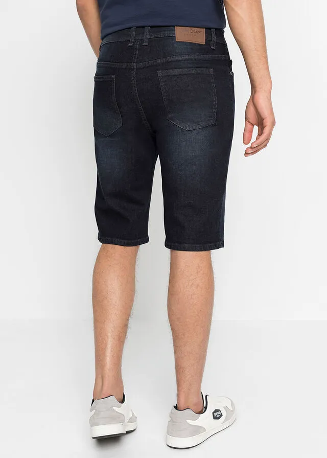 Elastic denim bermuda shorts with reinforced inseam, regular fit in dark wash.