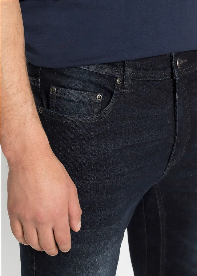 Elastic denim bermuda shorts with reinforced inseam, regular fit in dark wash.