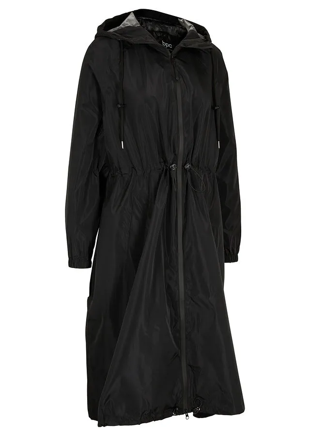 Functional and wide oversize waterproof black coat.