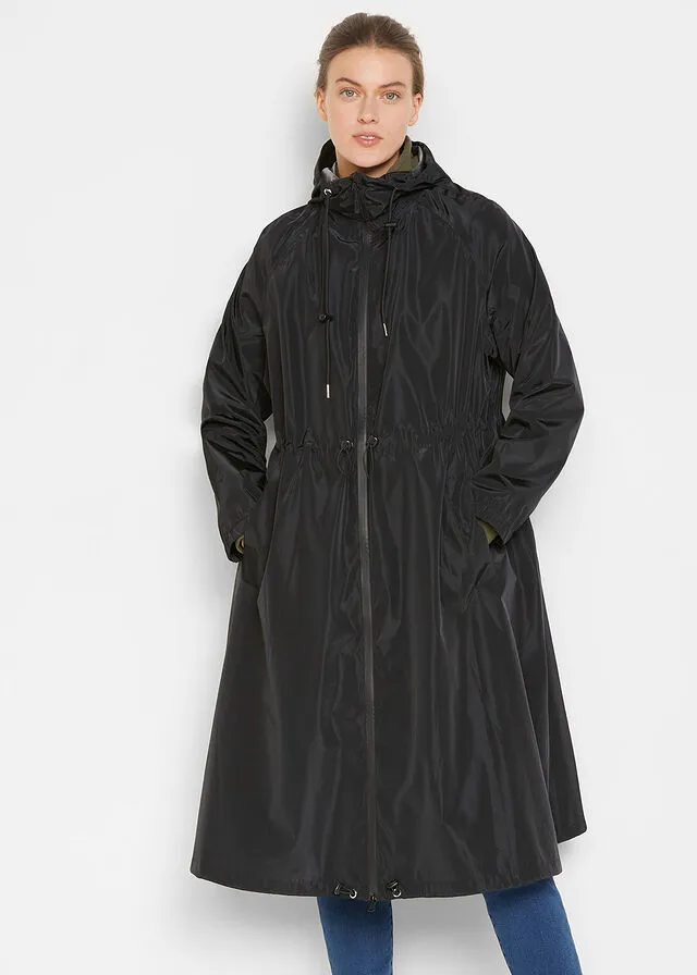 Functional and wide oversize waterproof black coat.