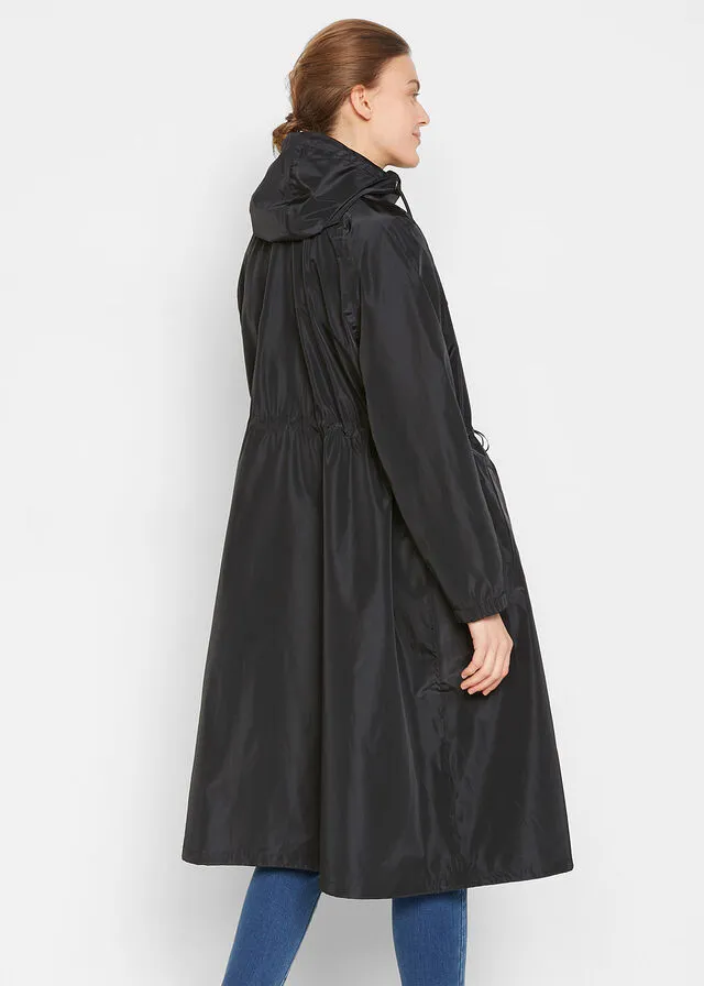 Functional and wide oversize waterproof black coat.