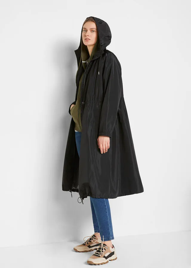 Functional and wide oversize waterproof black coat.