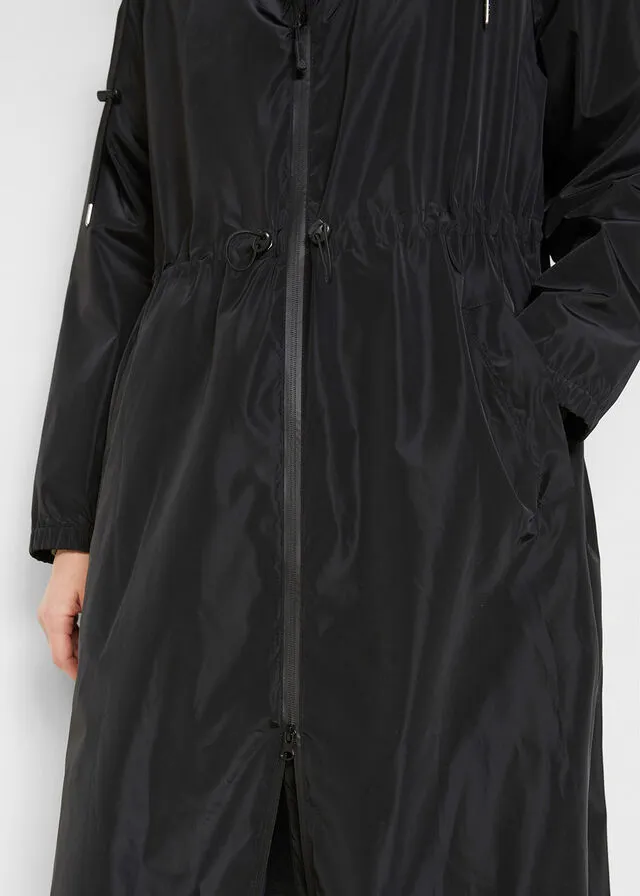 Functional and wide oversize waterproof black coat.