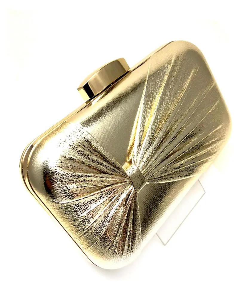 Gold evening and party bags for wedding godmothers.