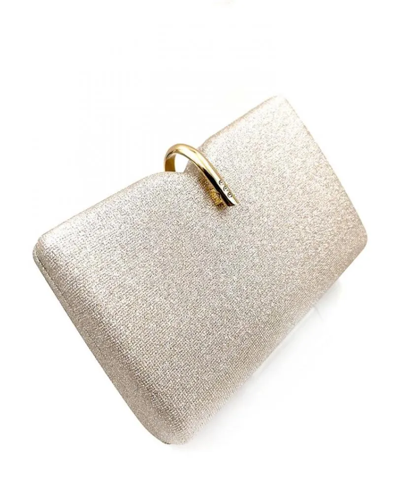 gold wedding clutch with beautiful jewel closure