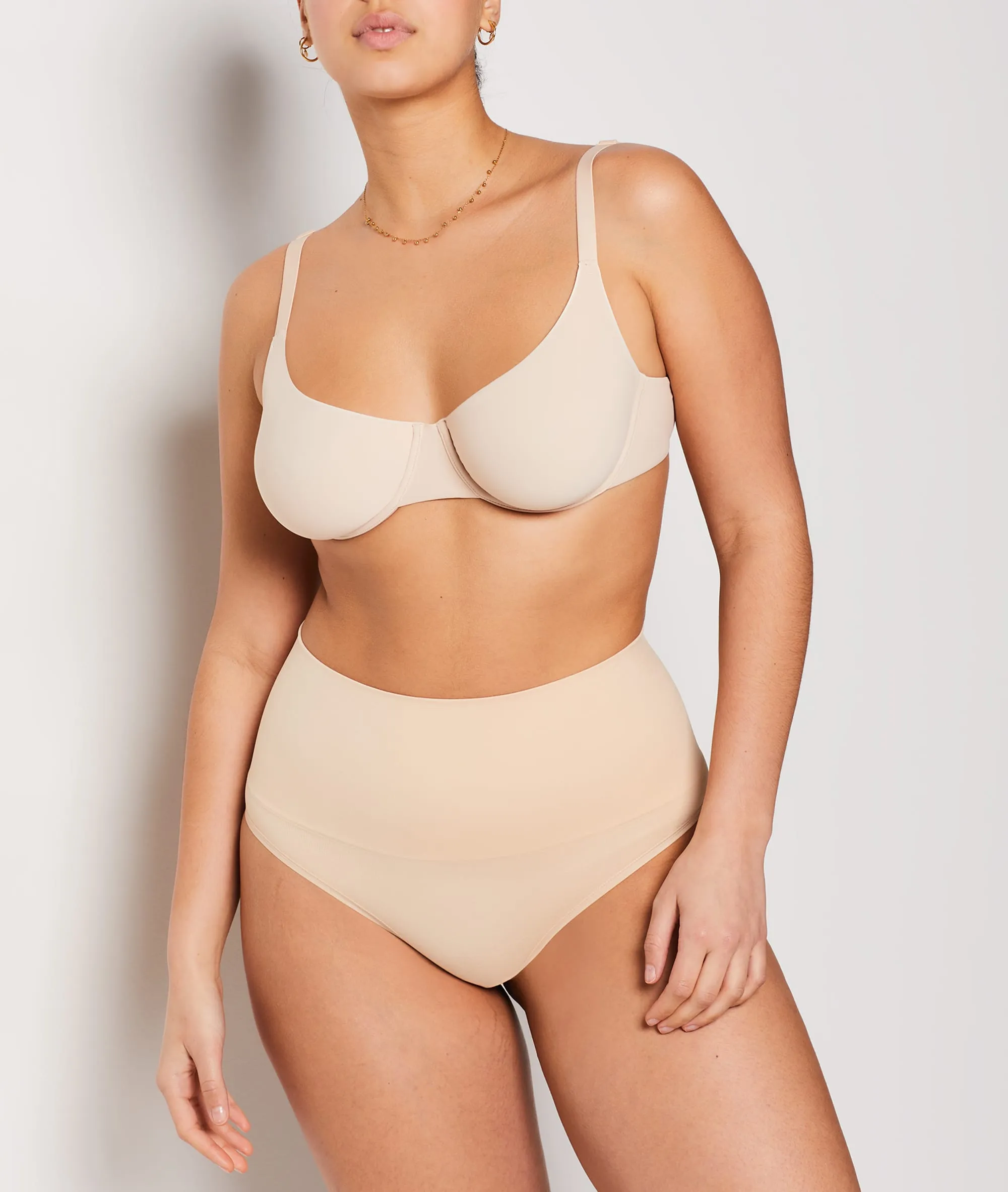 HIGHWAISTED THONG. MEDIUM SUPPORT POWER BY ETAM IN BEIGE. ETAM