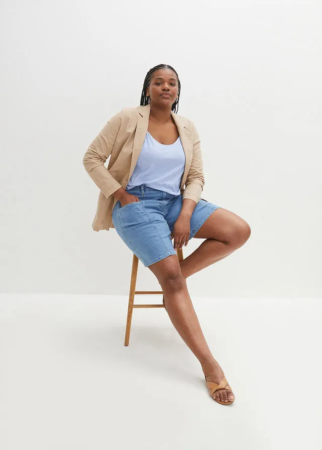 light blue denim Bermuda shorts with large pockets and comfortable waist