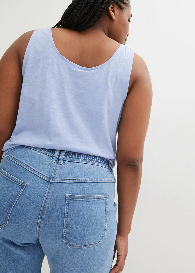 light blue denim Bermuda shorts with large pockets and comfortable waist