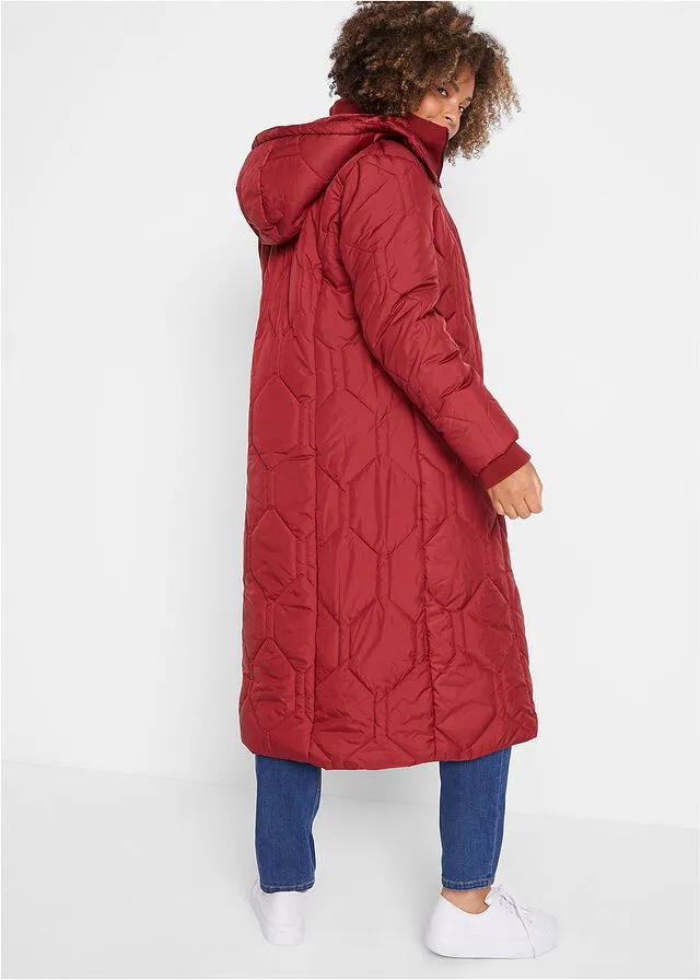 Long quilted jacket with diamond stitch in black.