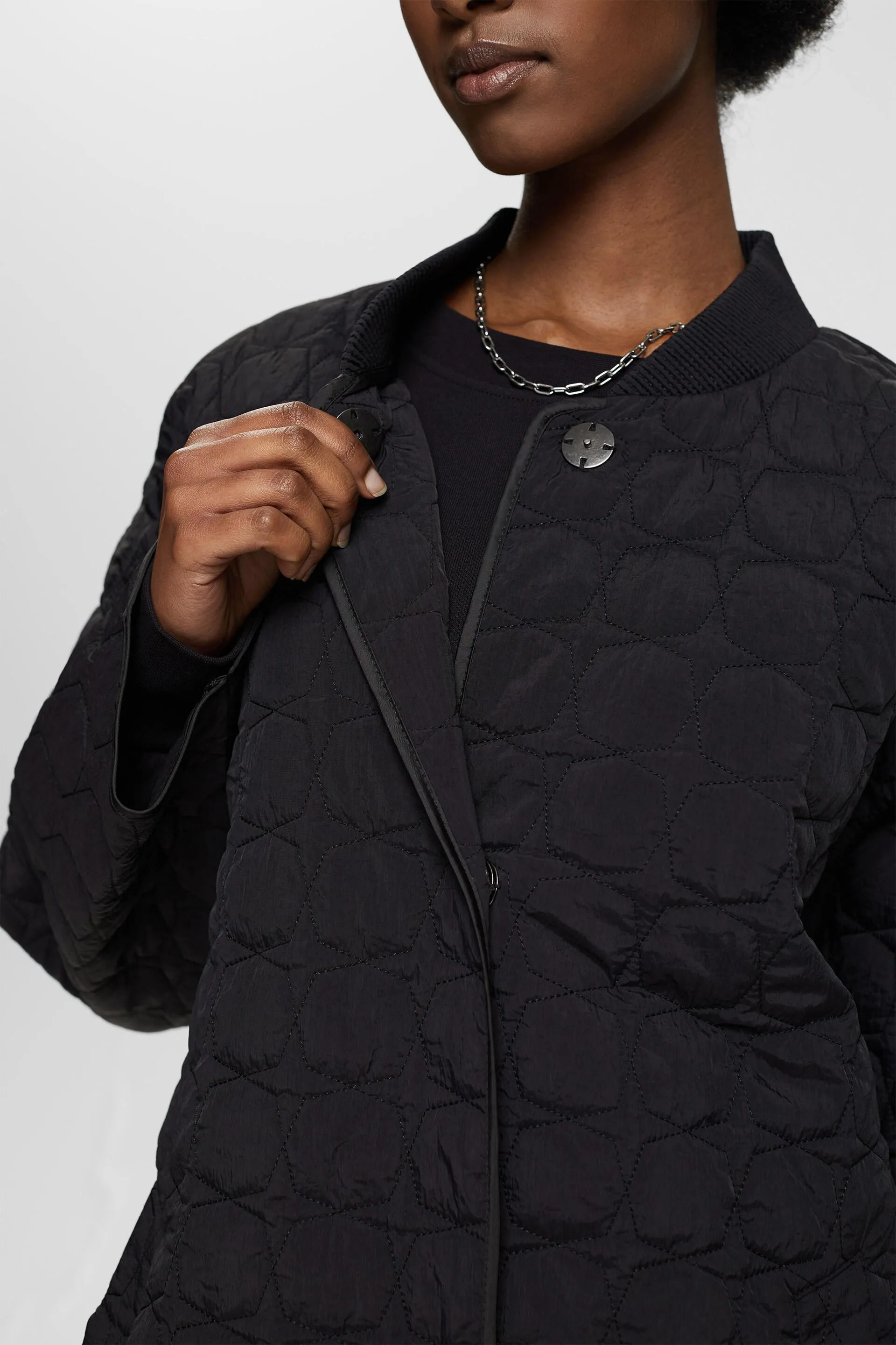 Long quilted jacket.