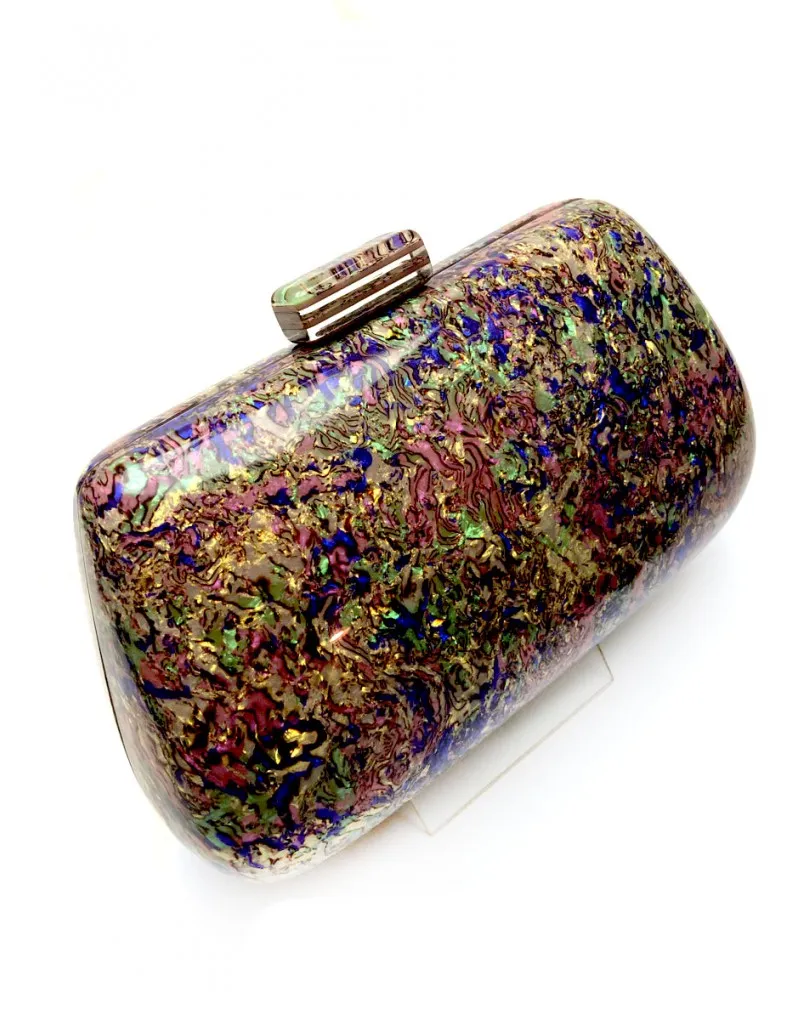 Party bags in green and blue tones made of imitation tortoise shell