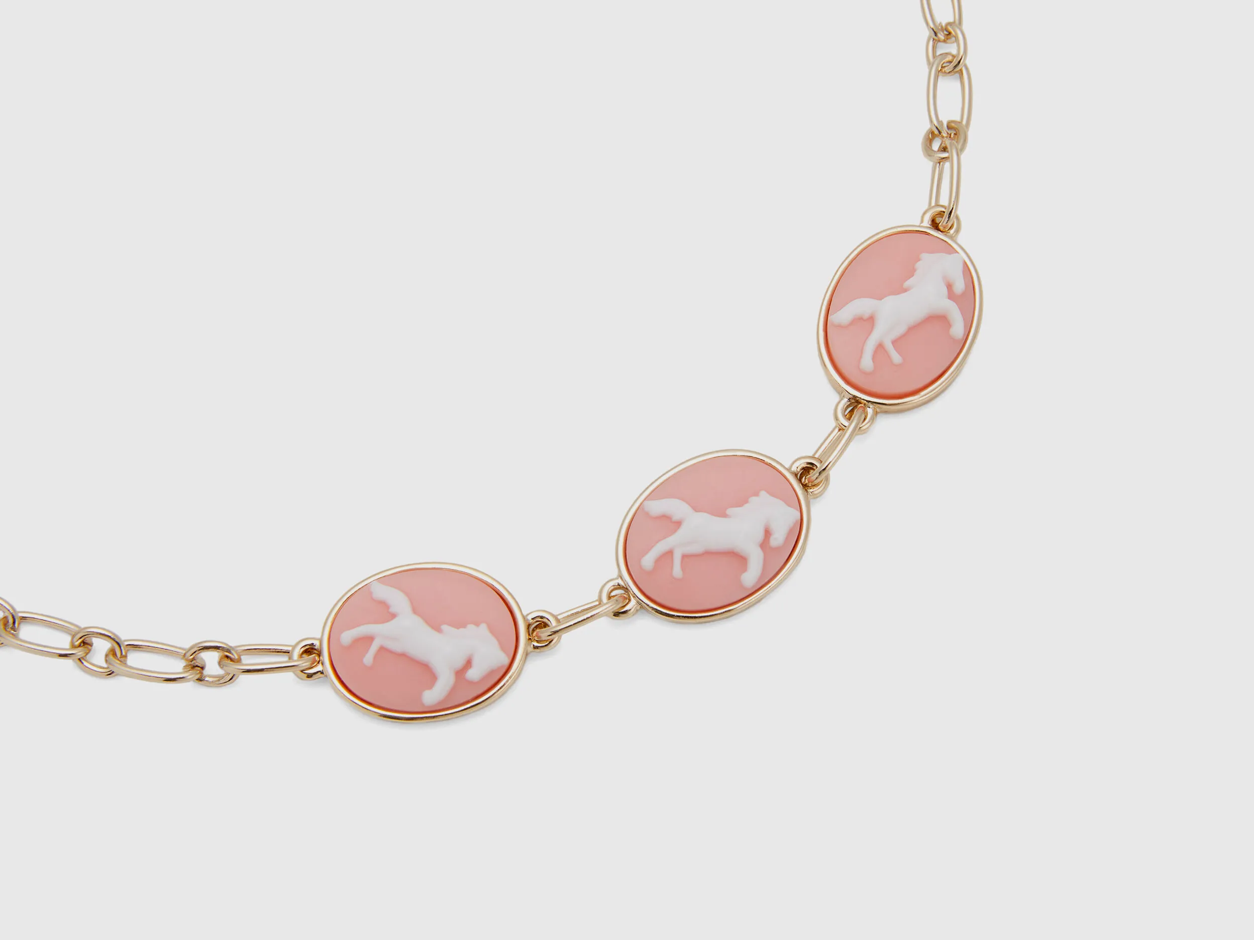 Pink cameo bracelet.