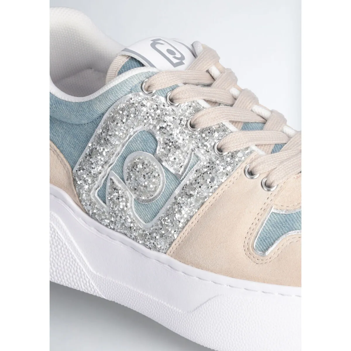 Shiny logo cowboy sneakers.