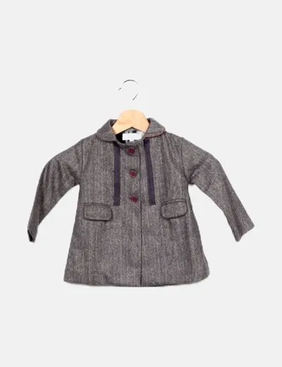 The lizard is crying, speckled gray coat.