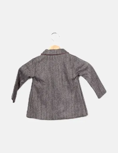 The lizard is crying, speckled gray coat.