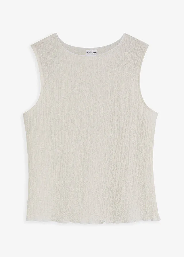 White wool top.