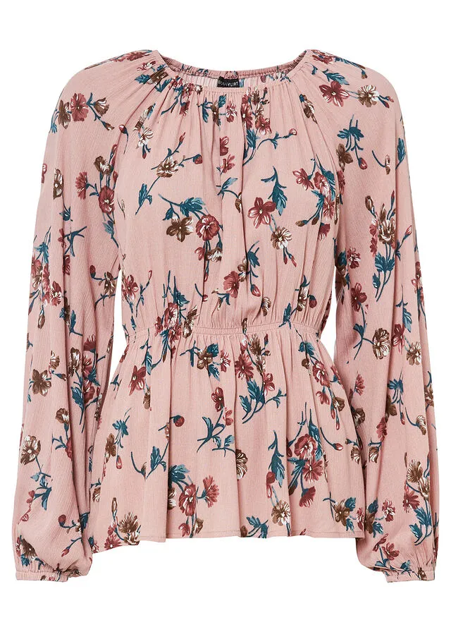 Wide pink floral blouse.
