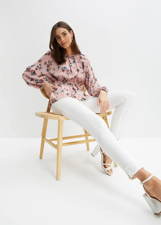 Wide pink floral blouse.
