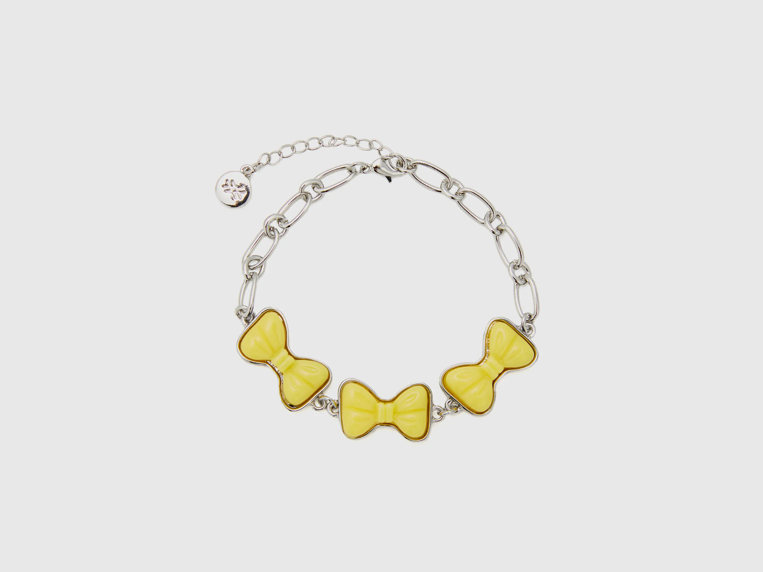 Yellow ribbon bracelet.